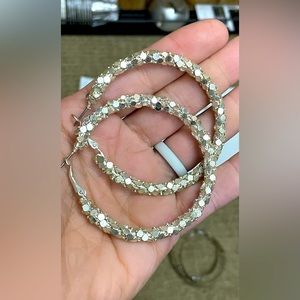 A collection consisting of 7 pairs of hoop earrings.